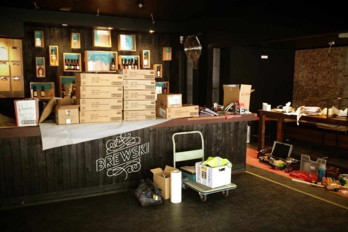 "This is what the bar looked like the morning of our opening. Note the lack of IPA lights. They were put up whilst people were ordering beers over the bar. That was one chaotic day."